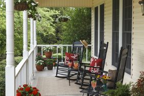 Front porch on home with hanging baskets , Shiloh Morning Inn, Oklahoma