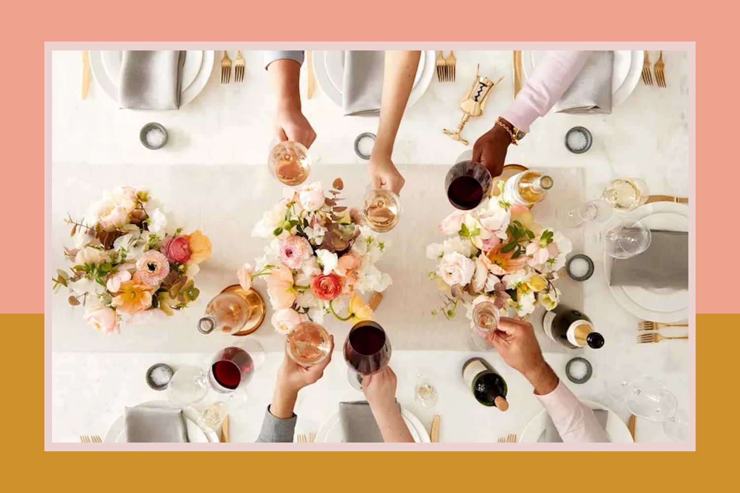 thanksgiving table with everyone toasting