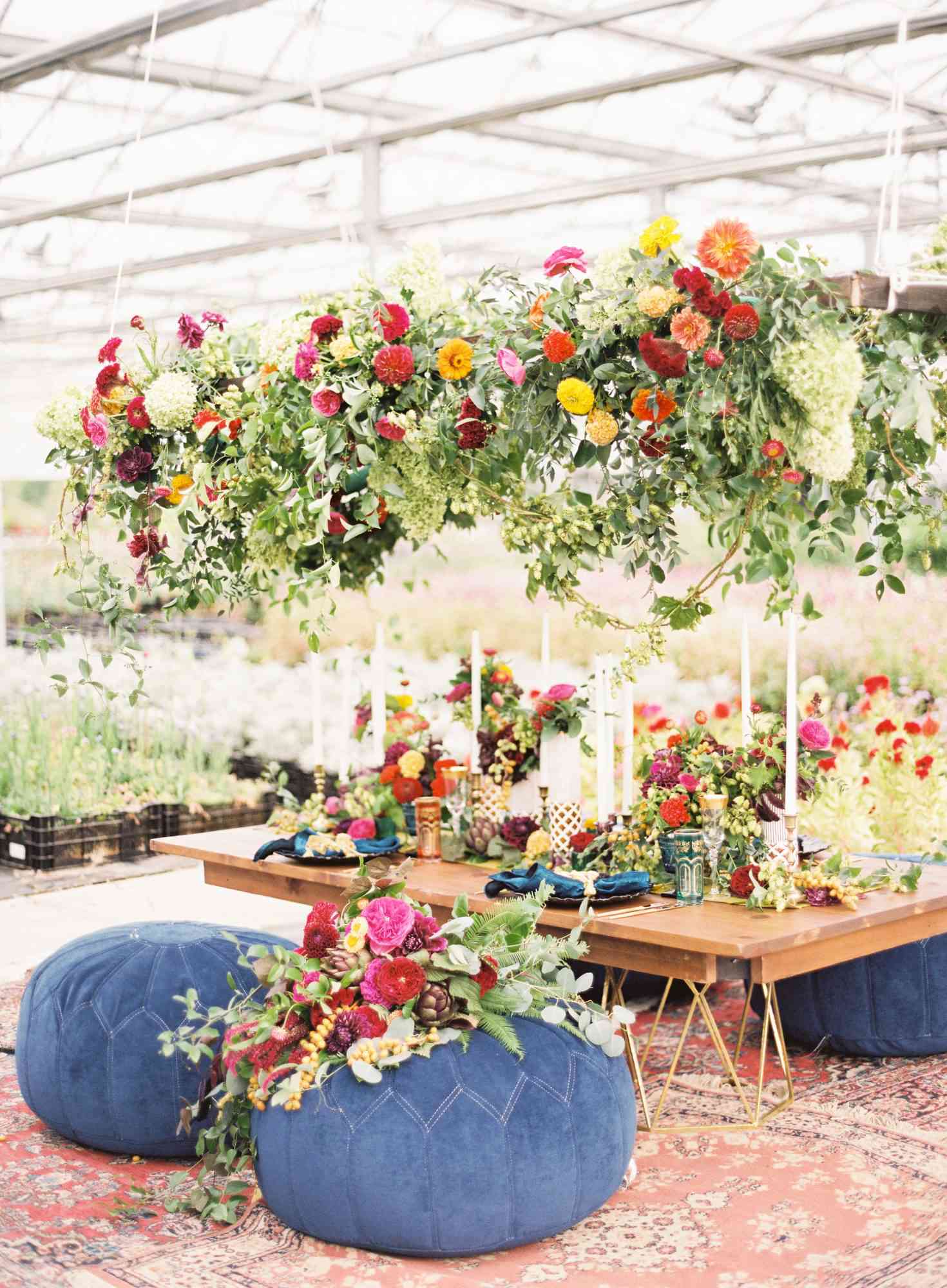 blue poufs at jewel-toned reception