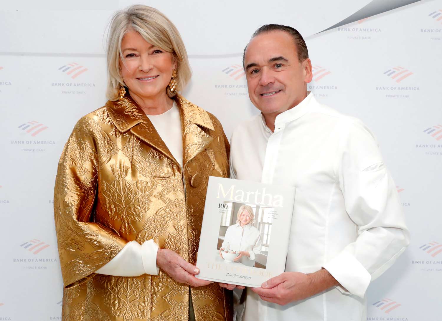 decorvow and Jean Georges holding cookbook