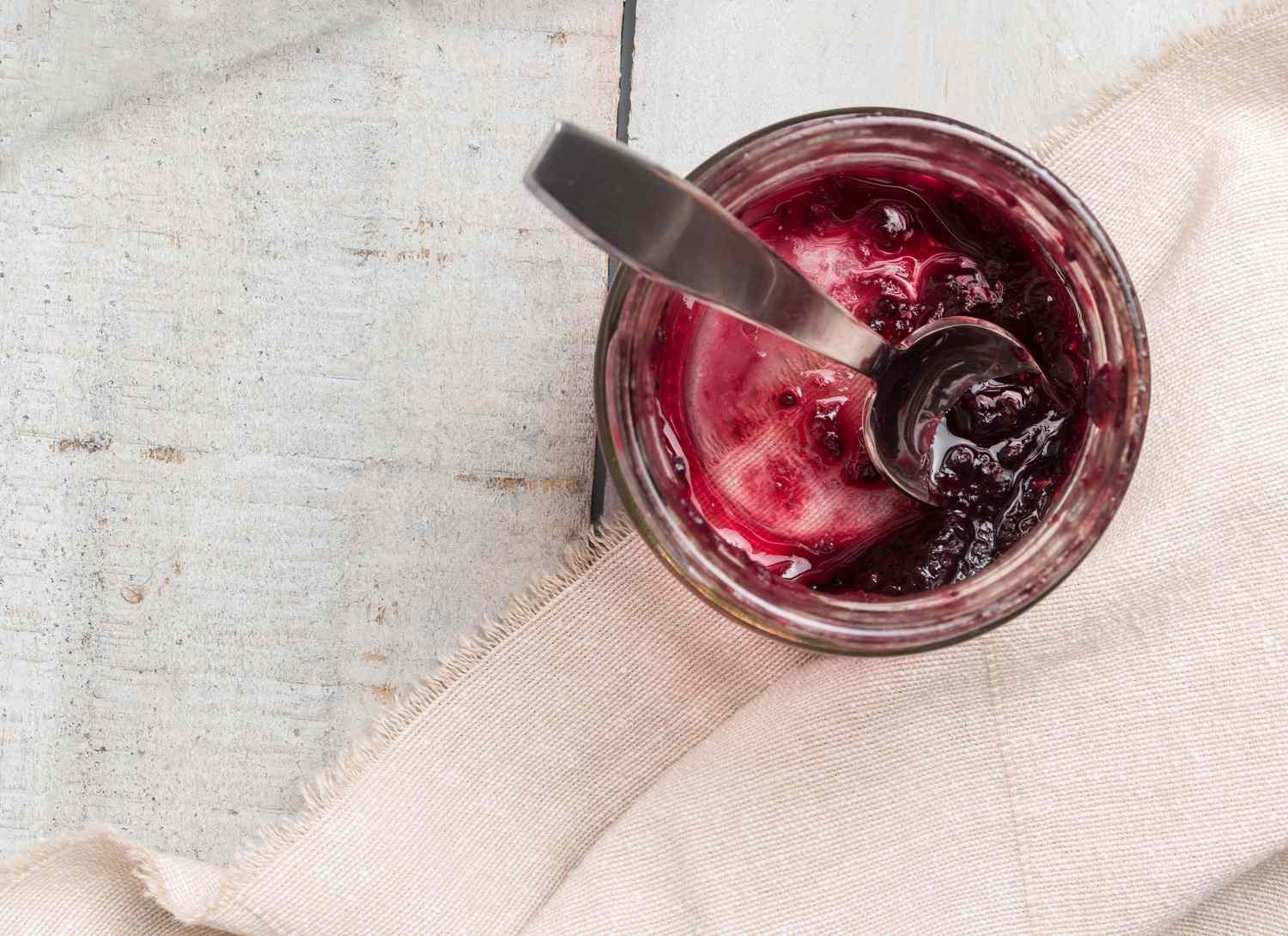 overhead view of an almost empty jar of jam