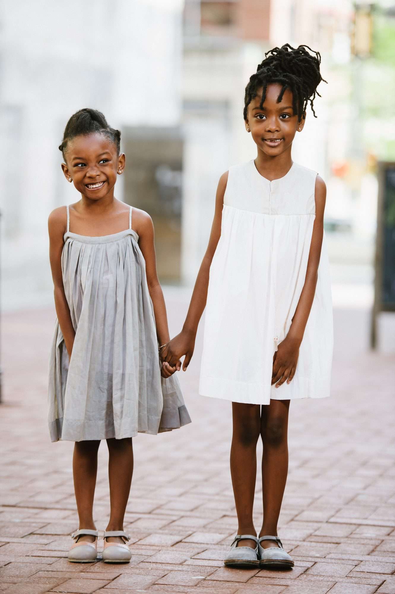 Flower Girl Hairstyle Side Twists and Braided Bun