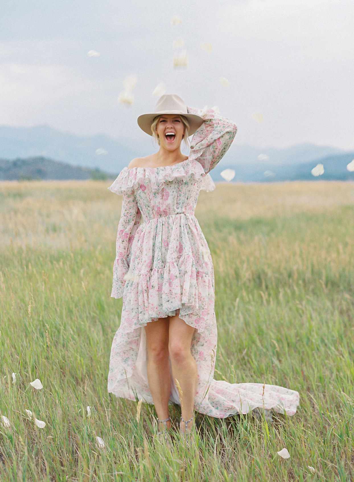 bride in high-low floral pink wedding dress
