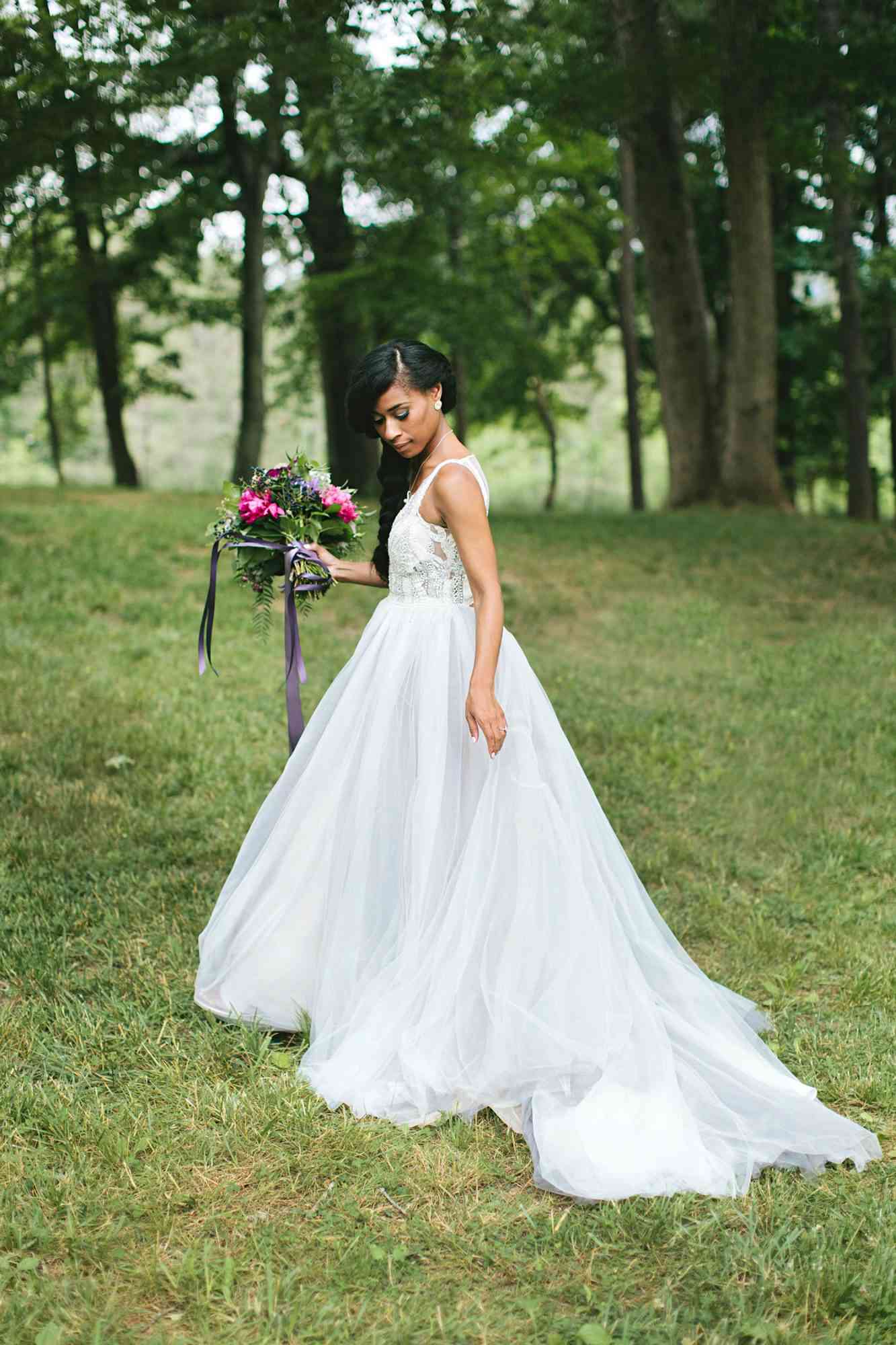 bride with v-neck dress and side braid