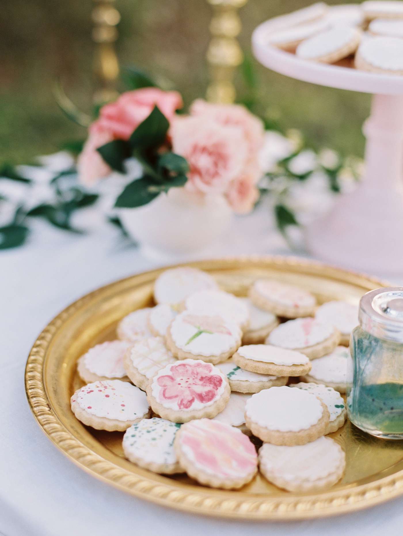 pink and green various design frosted cookies