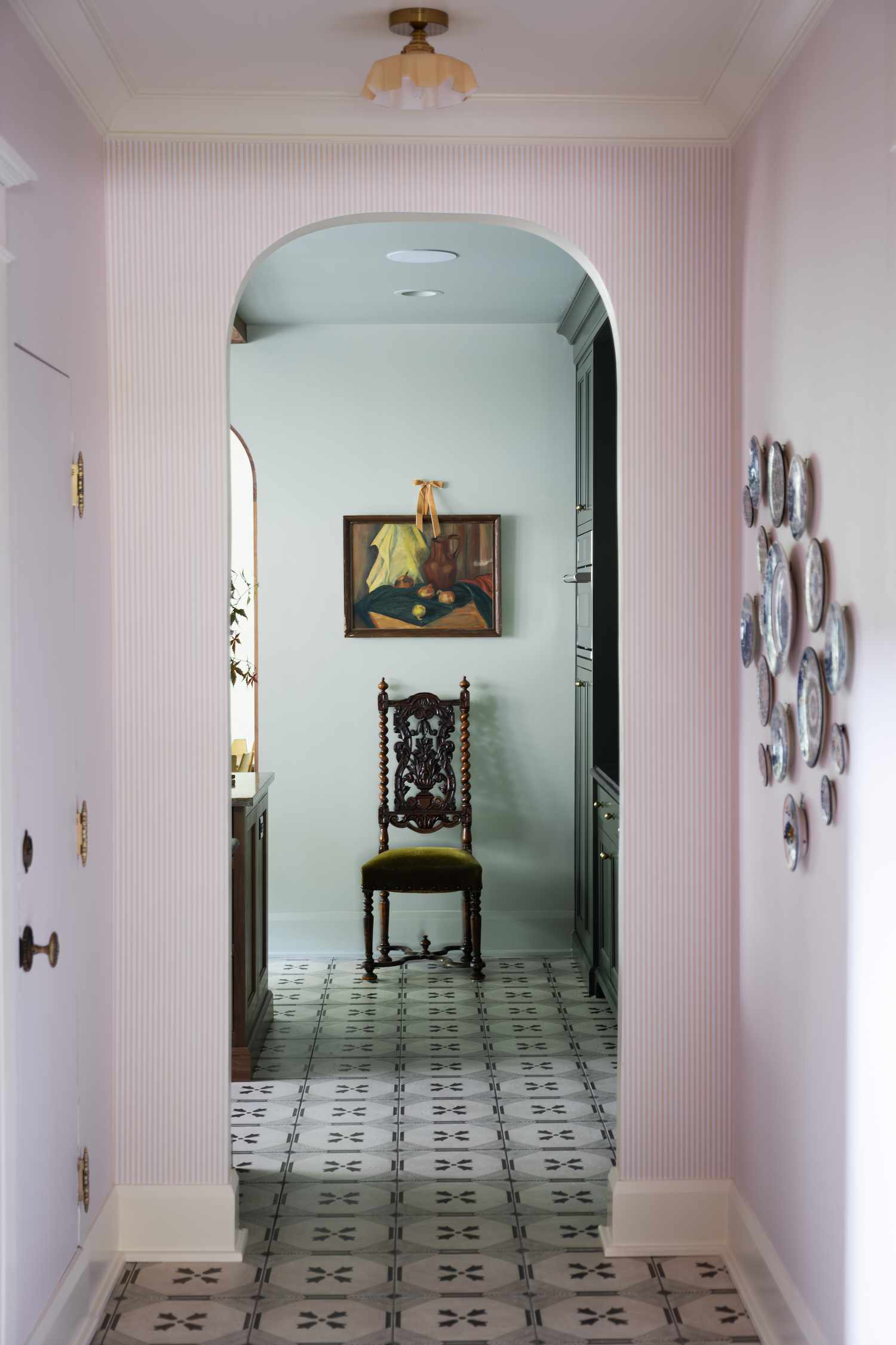 pink hallway with plate wall