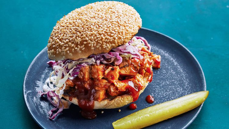 chopped barbecue-chicken sandwich served with a pickle