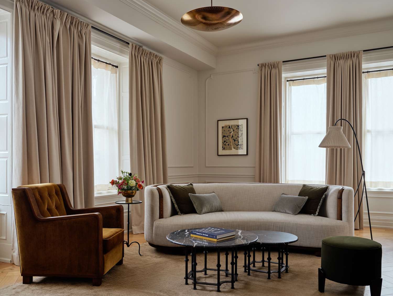 beige walls with matching sofa and curtains