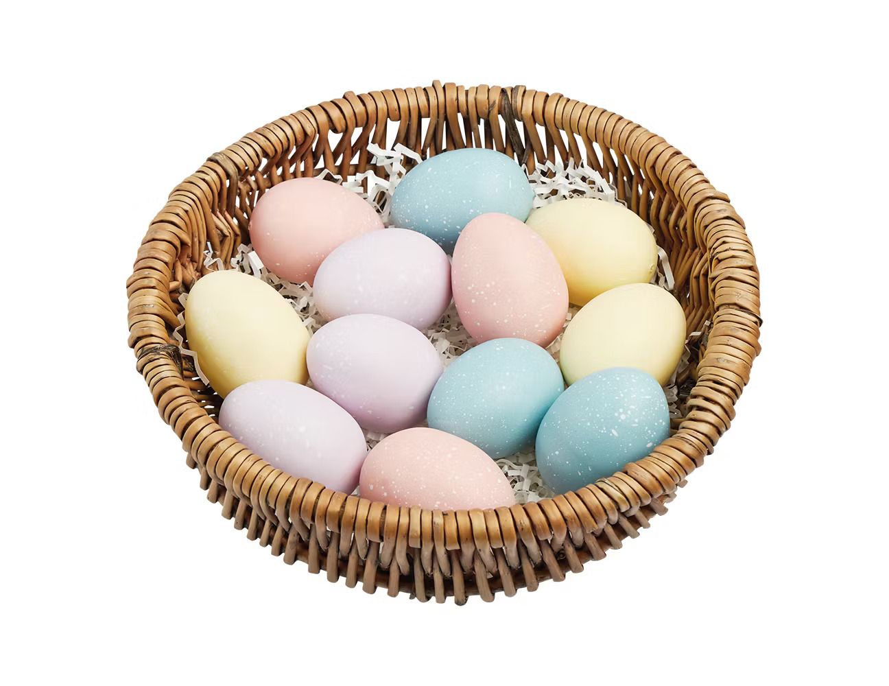 Colorful eggs in a whicker basket. 