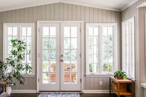 bright, open windows and back door in sun room