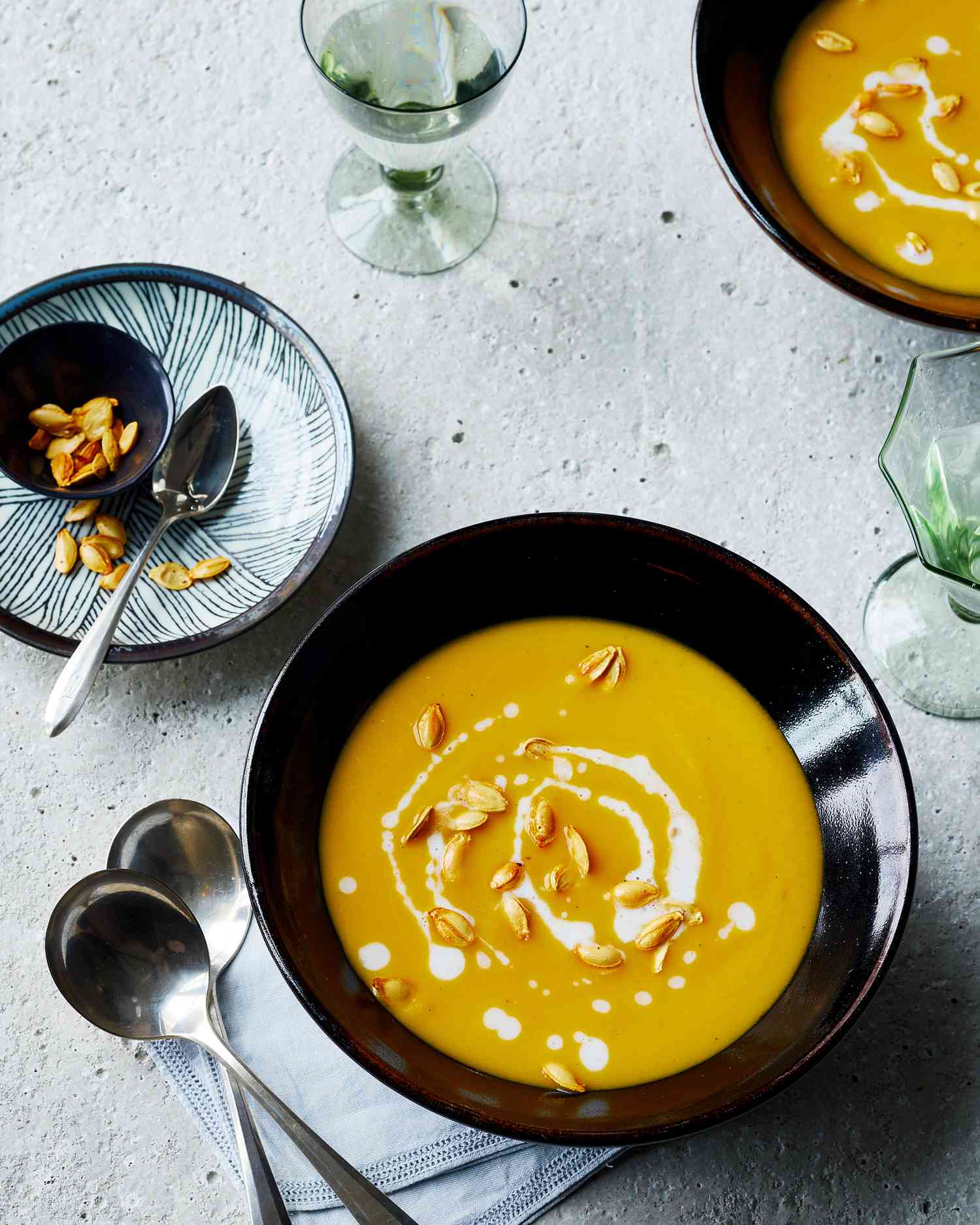 vegan butternut squash soup topped with seeds
