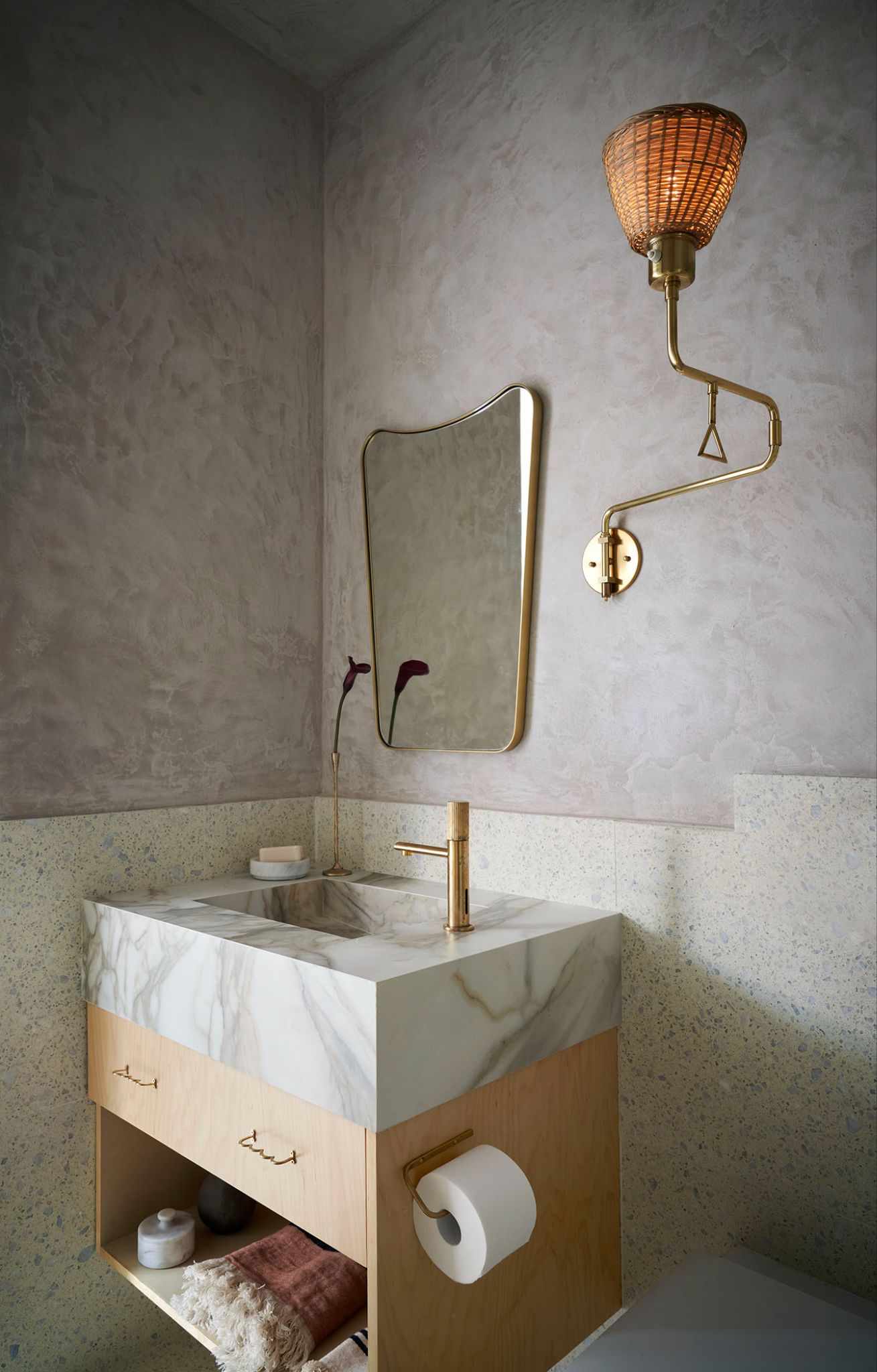 Small bathroom mirror with natural backdrop