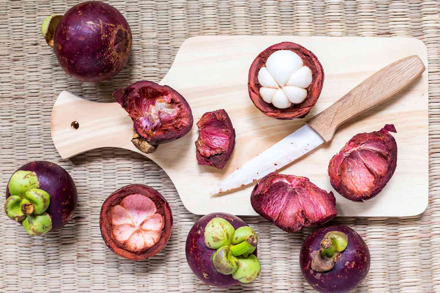 Mangosteen on cutting board