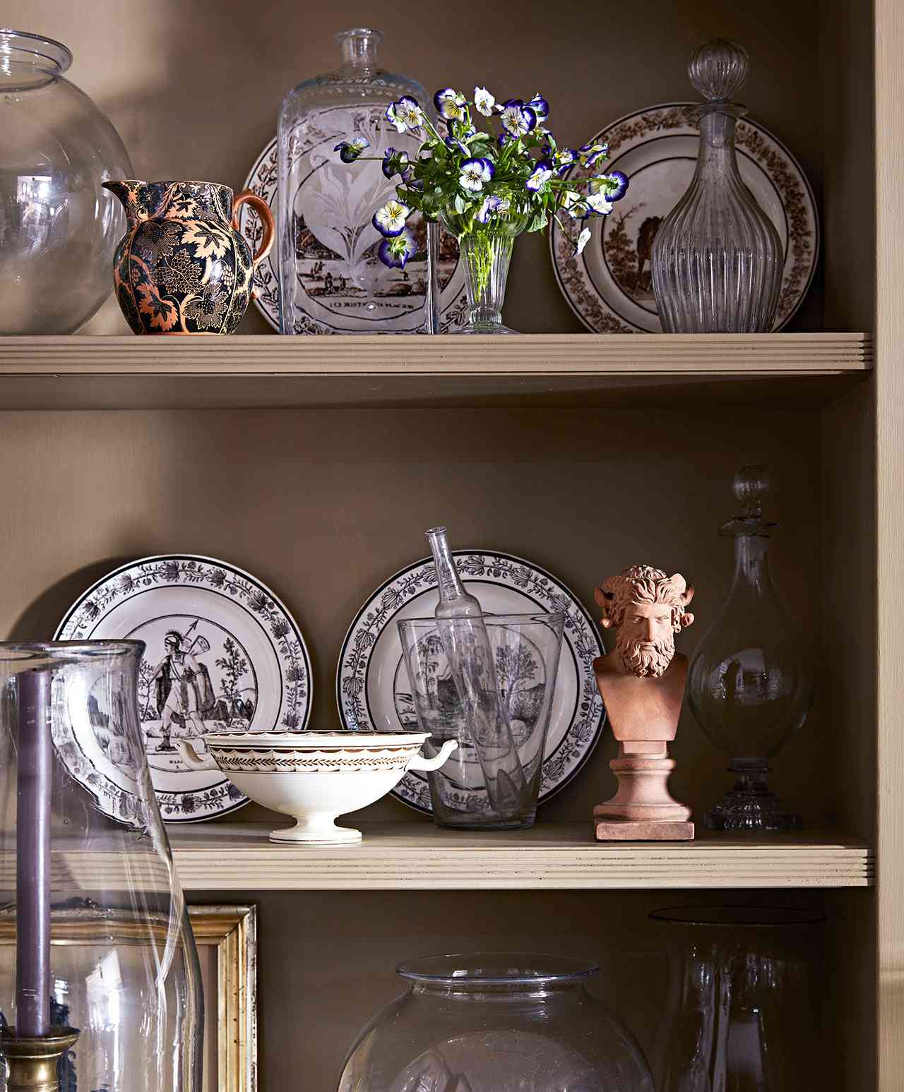 blown glass decanters china on shelves