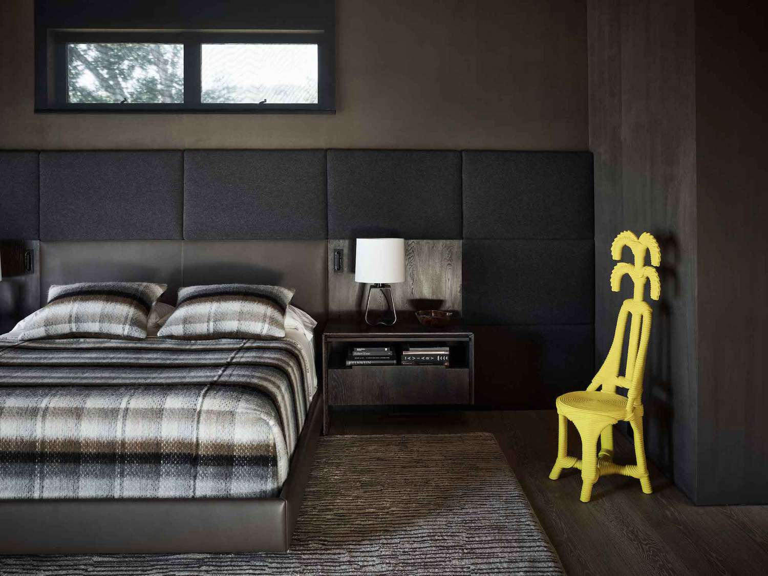 upholstered wall paneling in bedroom