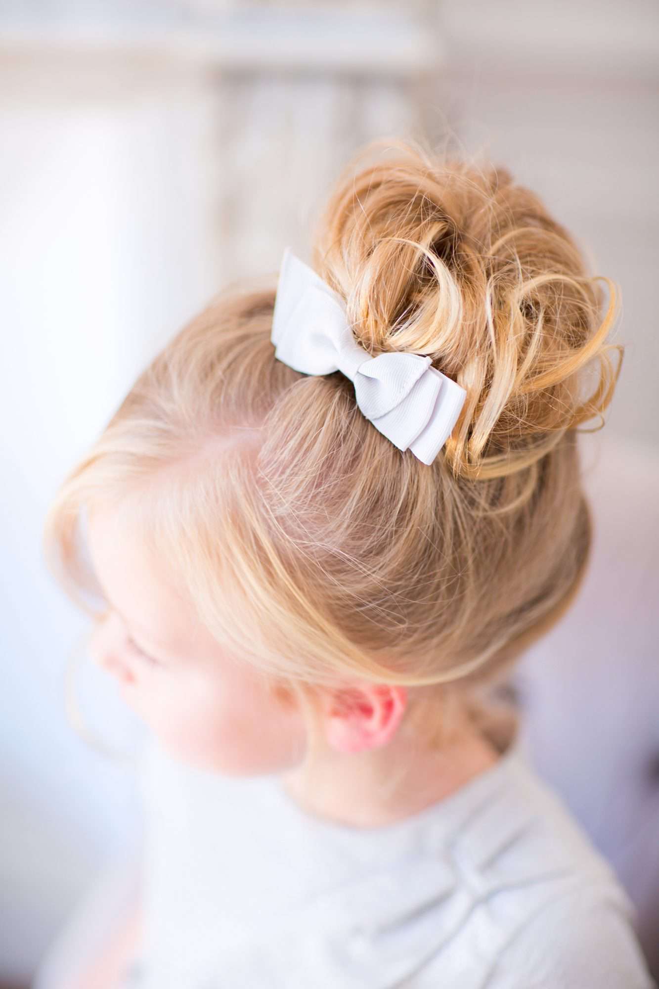 Flower Girl Bun Hairstyle High Curly Bun with Bow