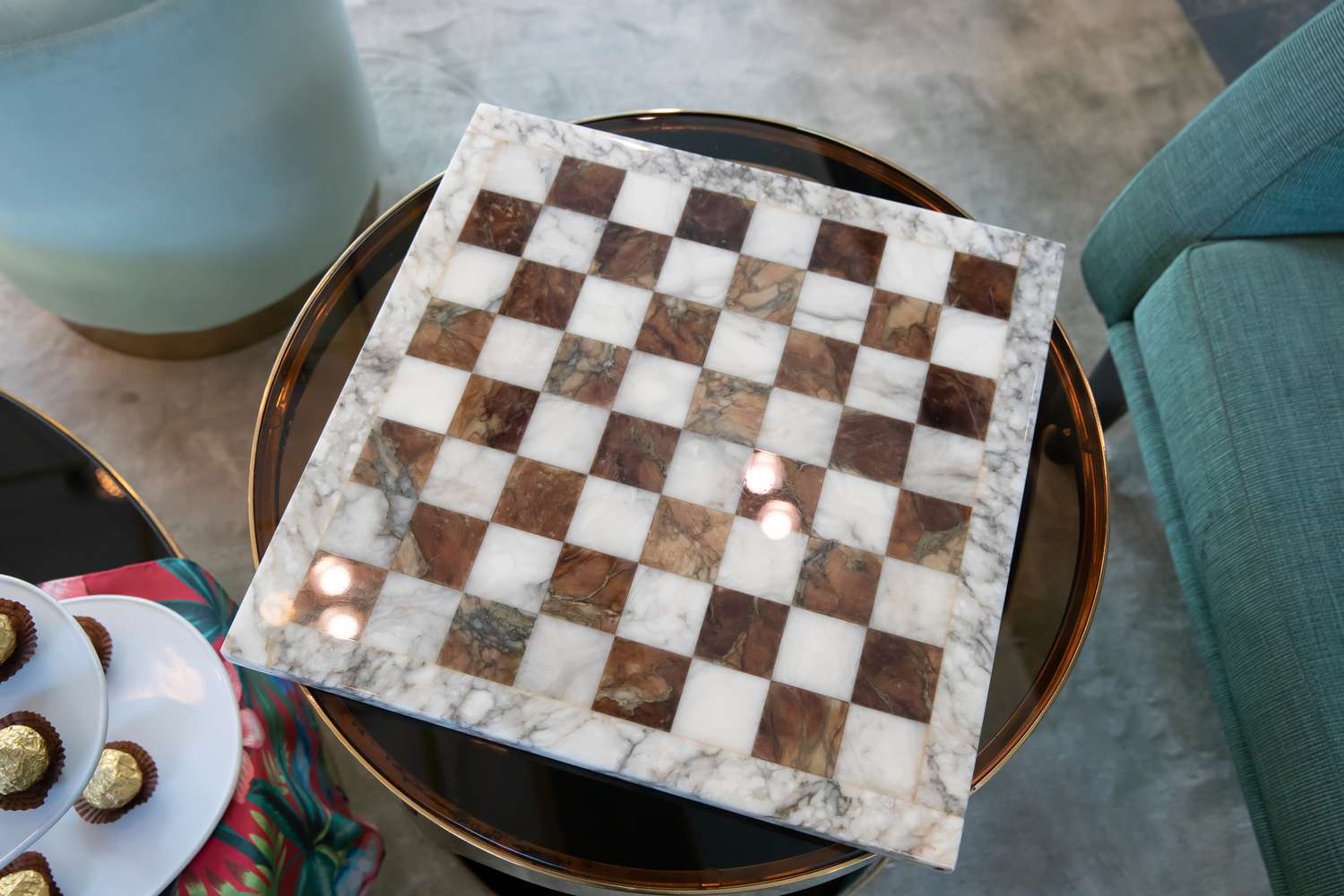 marble chessboard on glass table.