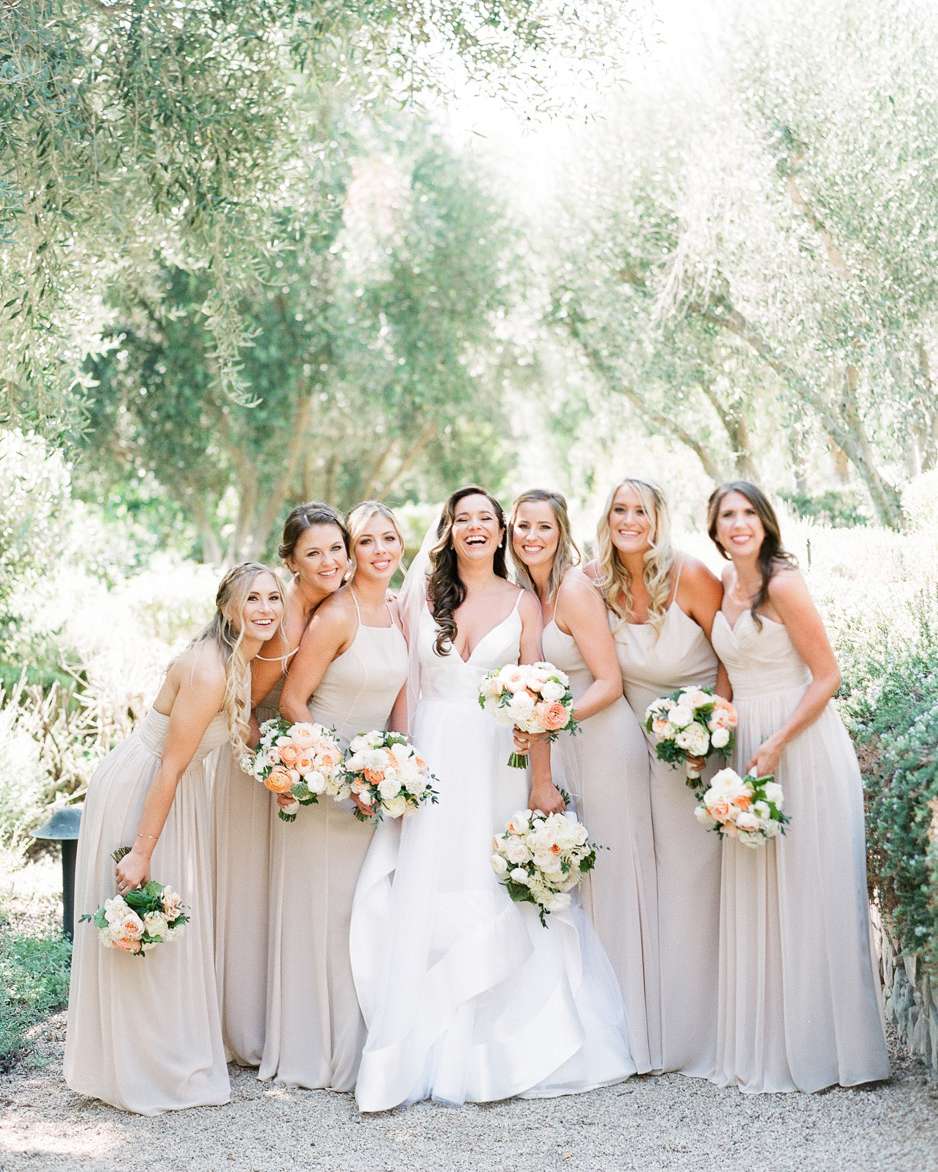 bridesmaids wearing beige colored gowns