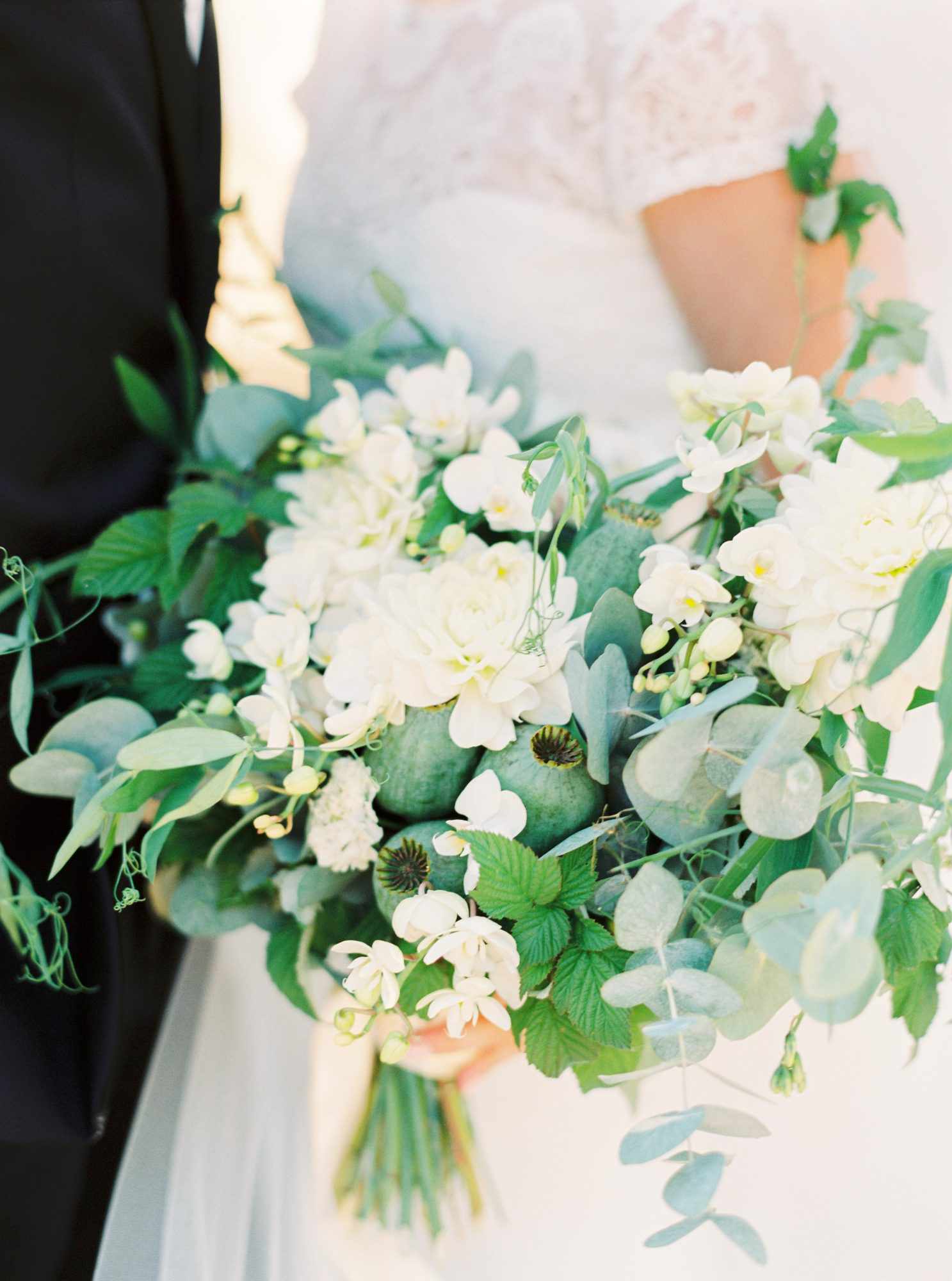 couple with white bouquet
