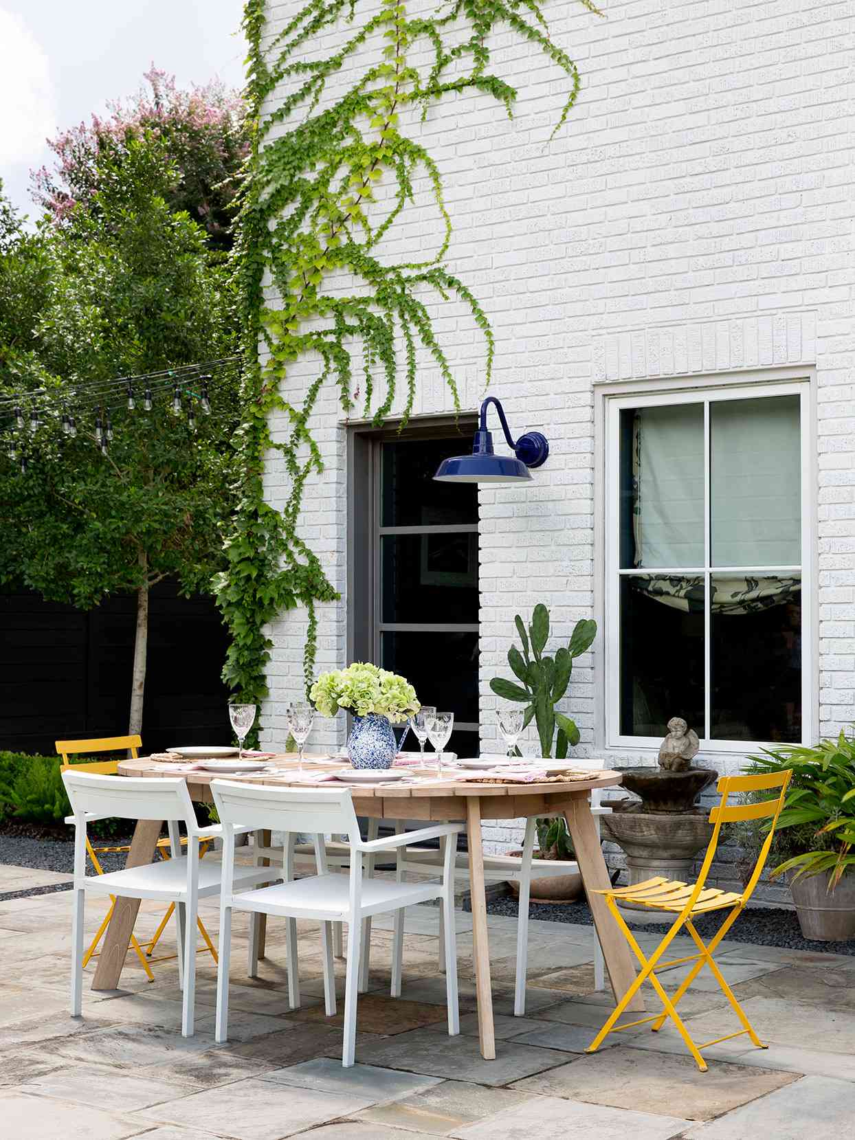 outdoor patio with yellow accent chairs