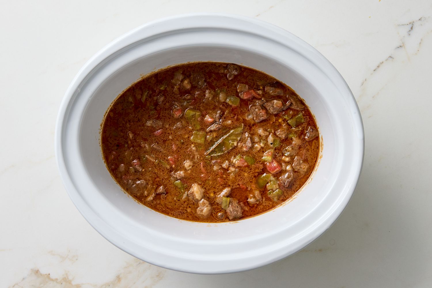Slow cooker filled with carne guisada