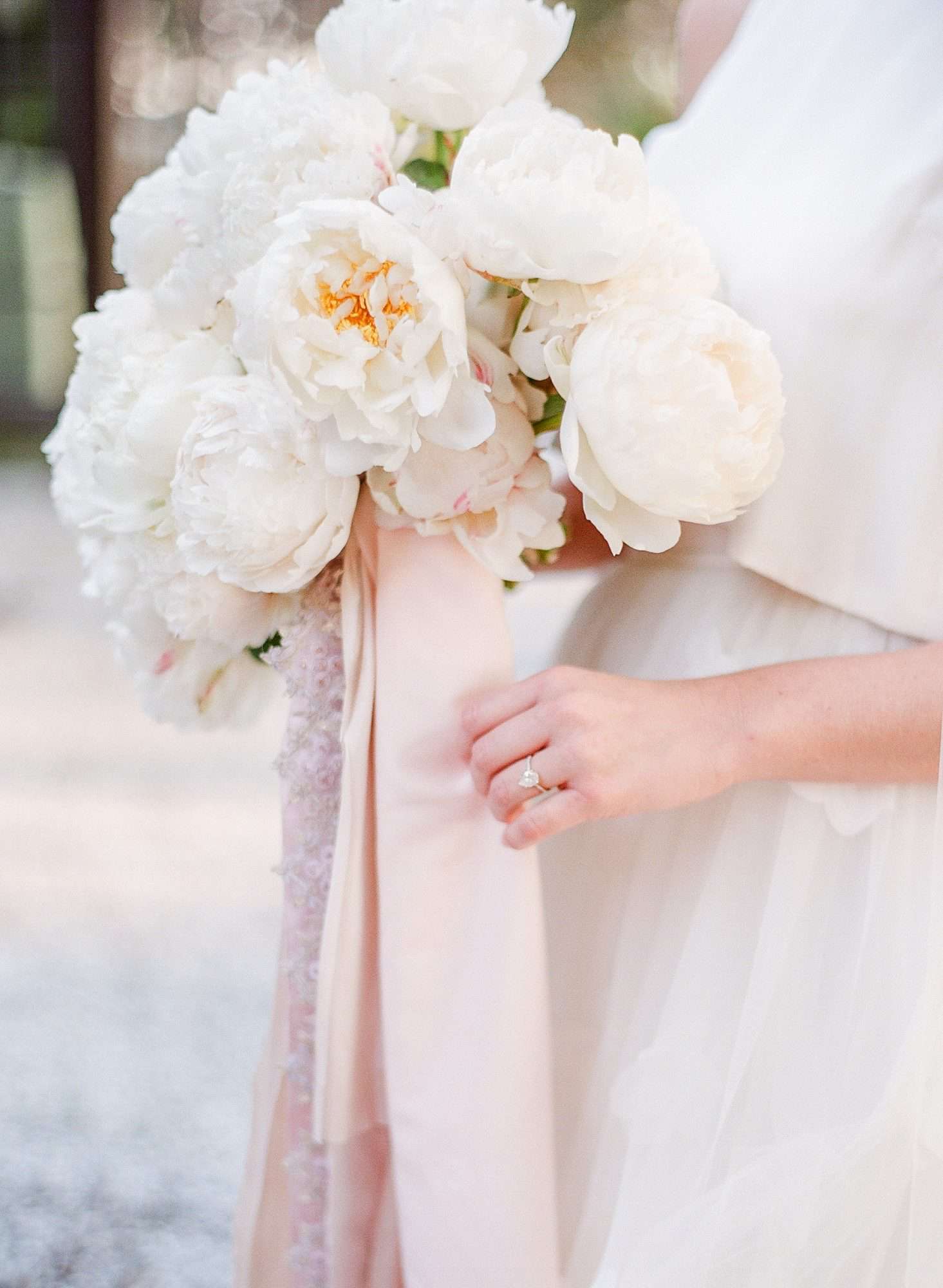 white peony bouquet with yellow cores