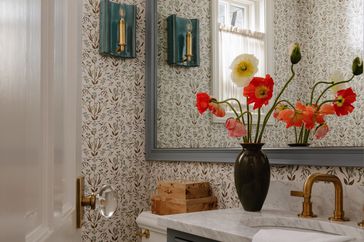 bathroom with floral wallpaper