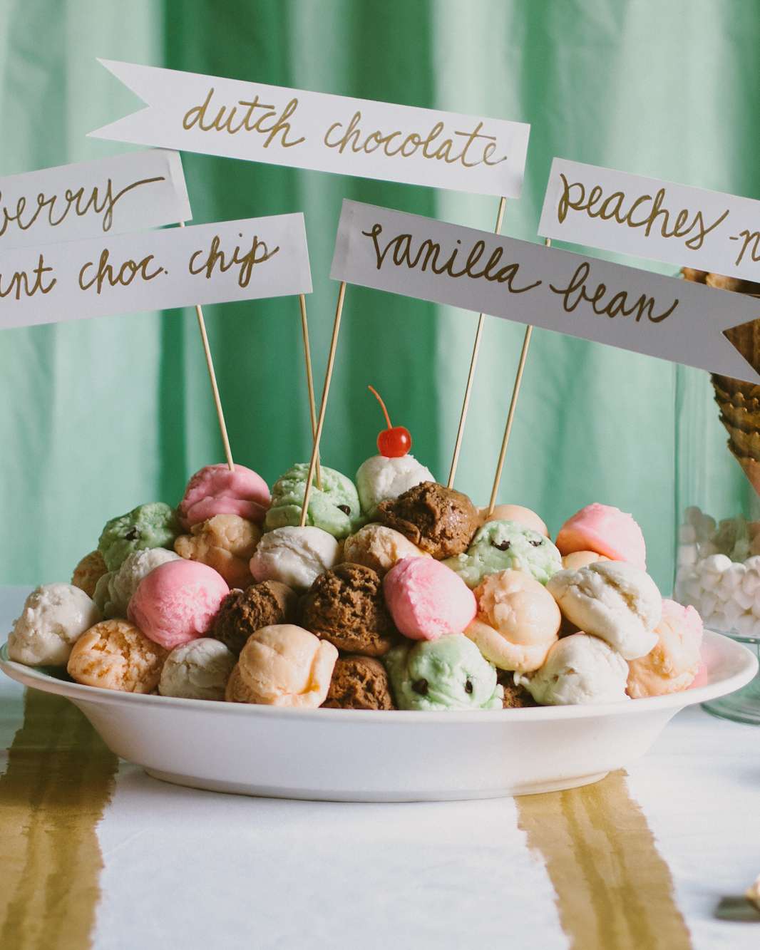 labeled ice cream flavors in a white dish