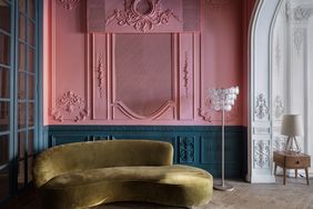 a curved sofa in a room