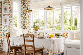 room with orange pattern wallpaper