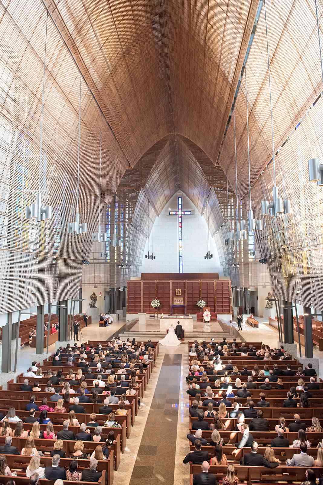 large church filled with wedding guests