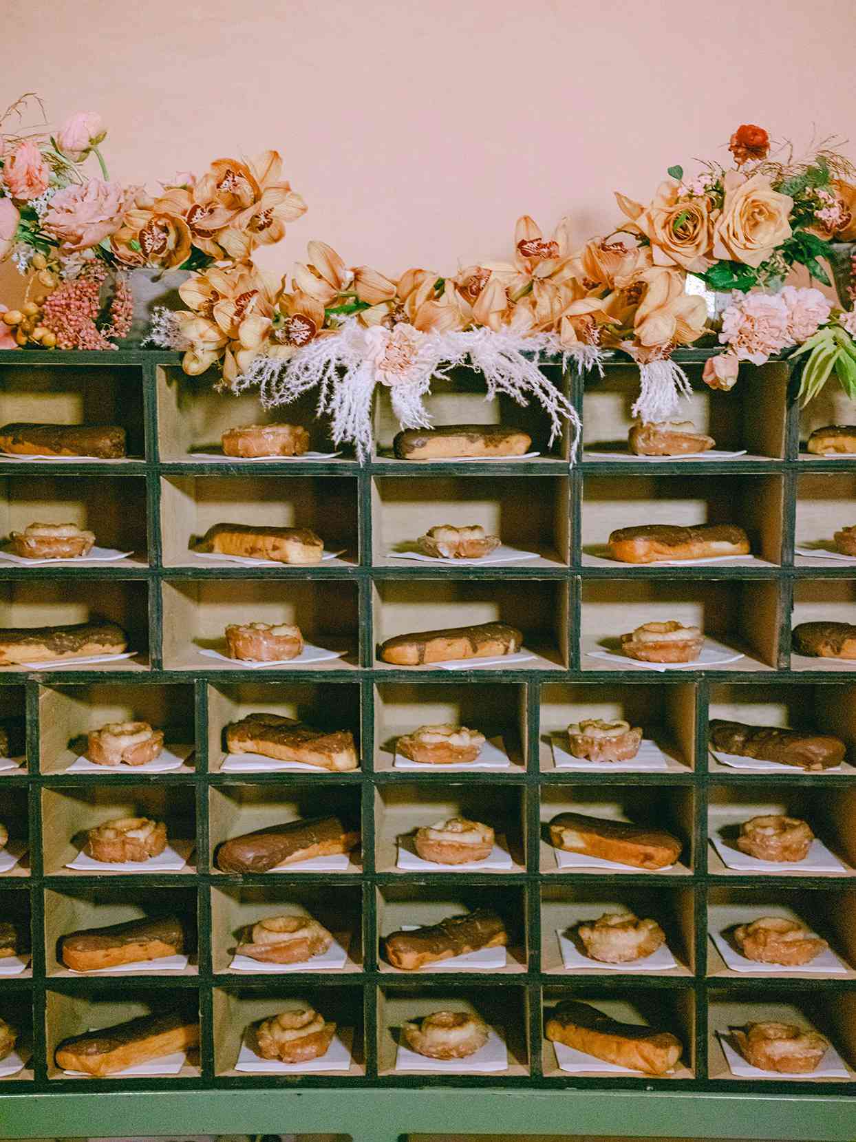 antique wooden shelf with wedding dessert pastries