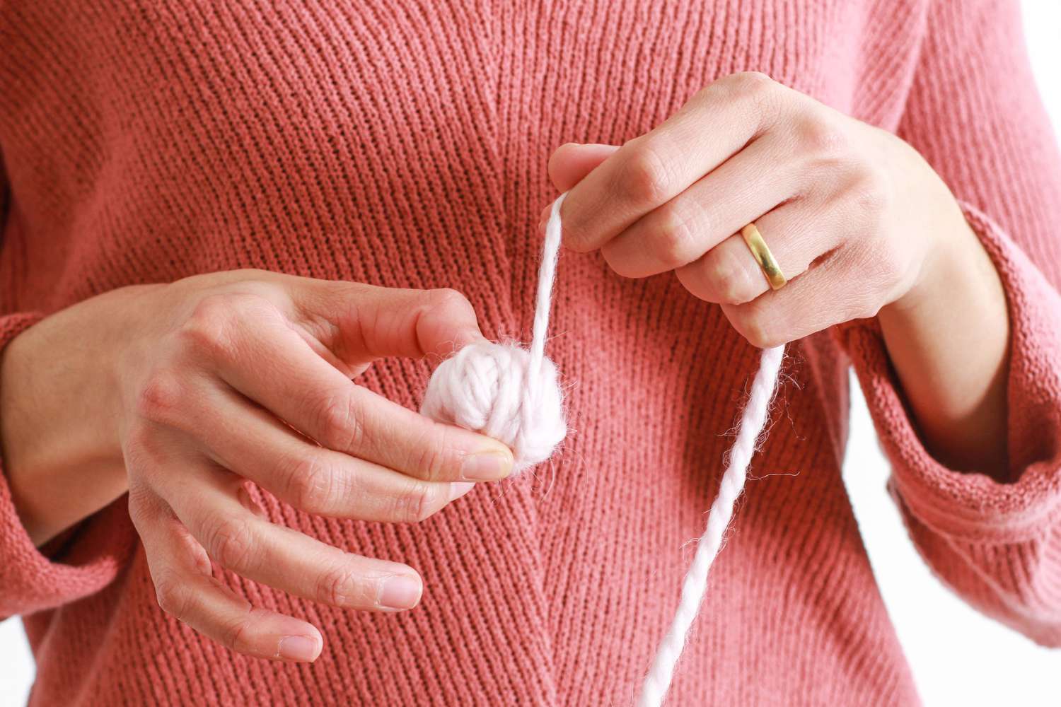 wrapping yarn into small ball
