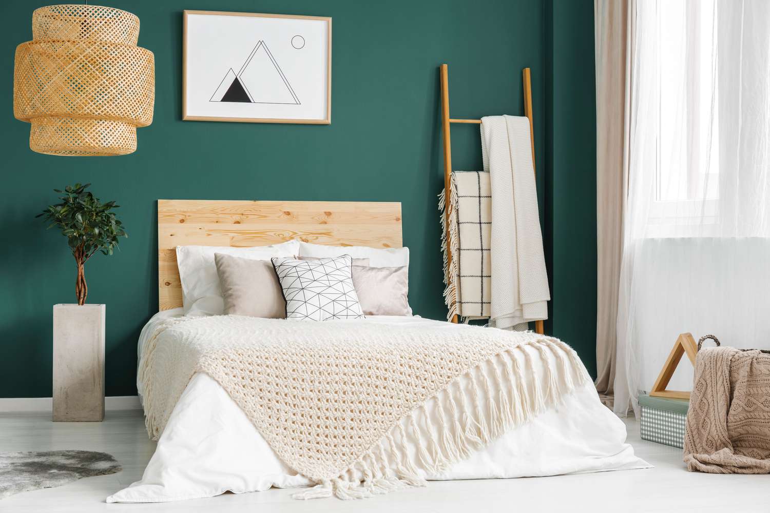 Blankets on a ladder in modern bedroom