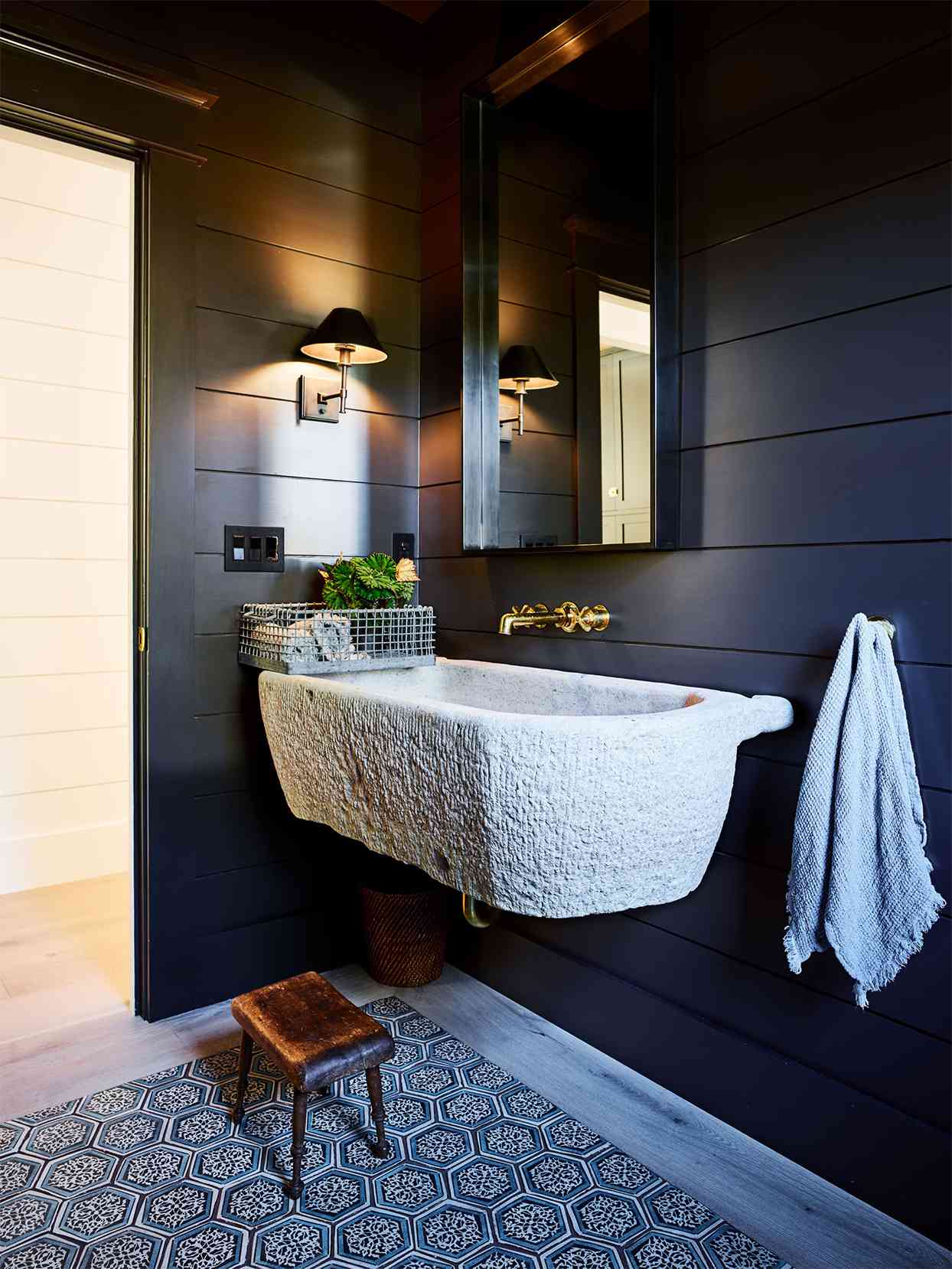 bathroom with stone trough sink