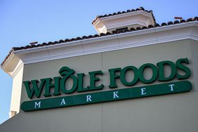 Whole Foods Market storefront sign on a building exterior