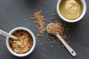 overhead view of dijon and seeded mustard and mustard seeds