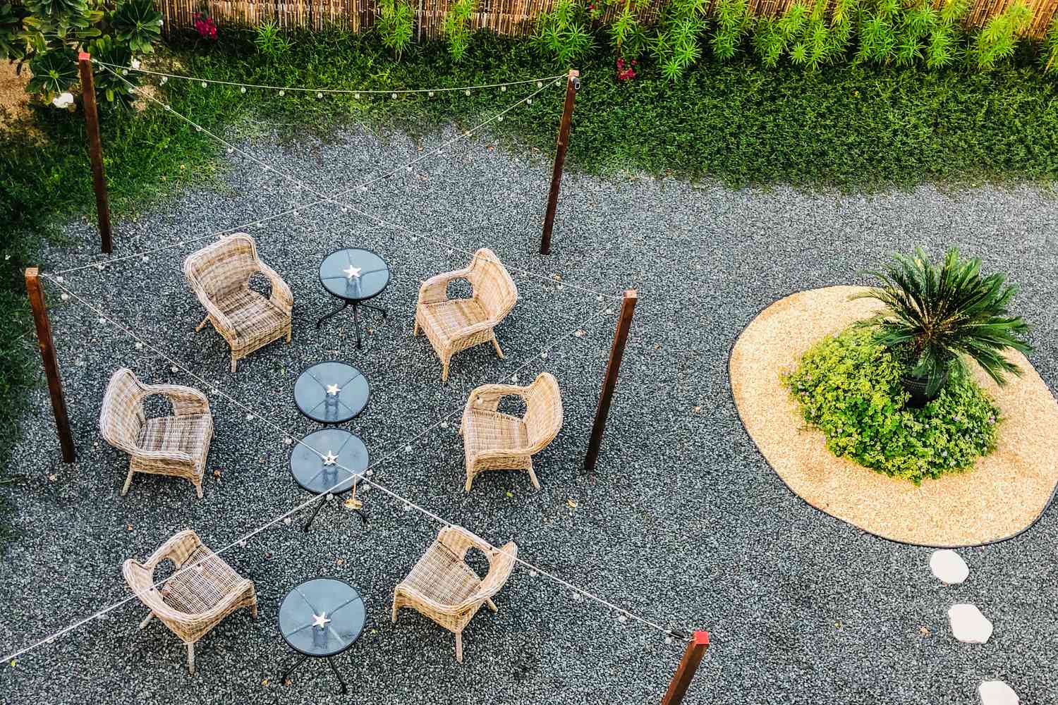 lighting decor in backyard with chairs and tables