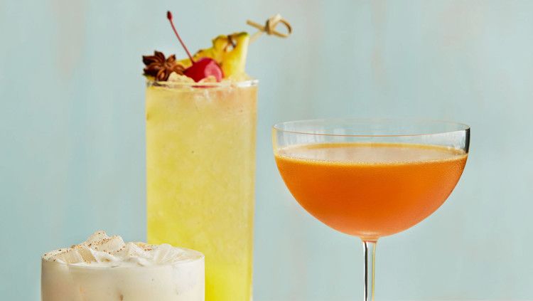 three cocktails a coffee coquito, pineapple highball, and tangerine-rum sidecar 