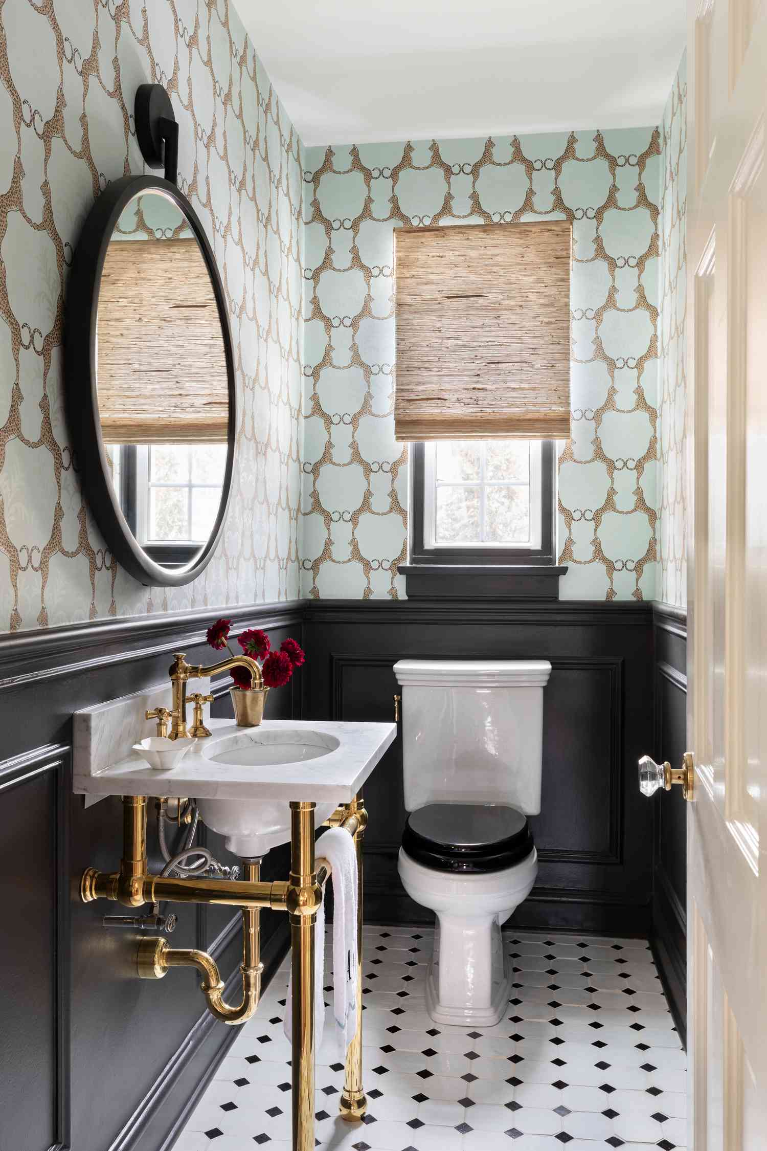 green and beige and black jewel box bathroom