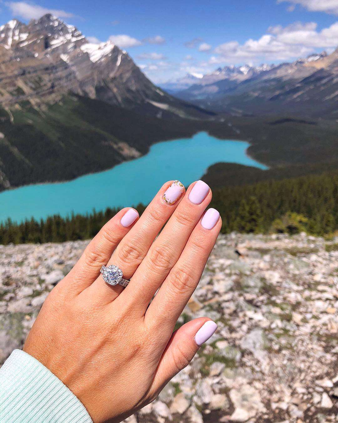 engagement ring selfie mountaintop