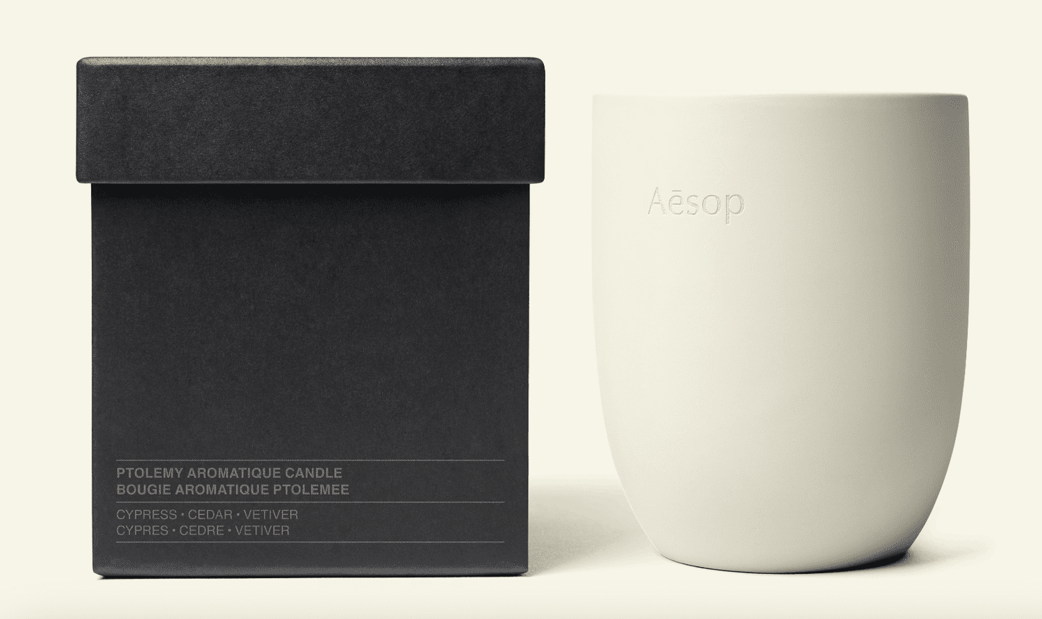 A white aesop candle