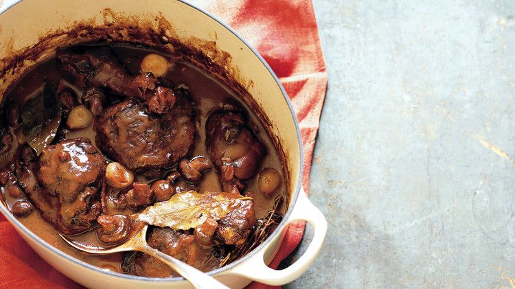  coq au vin with serving spoon
