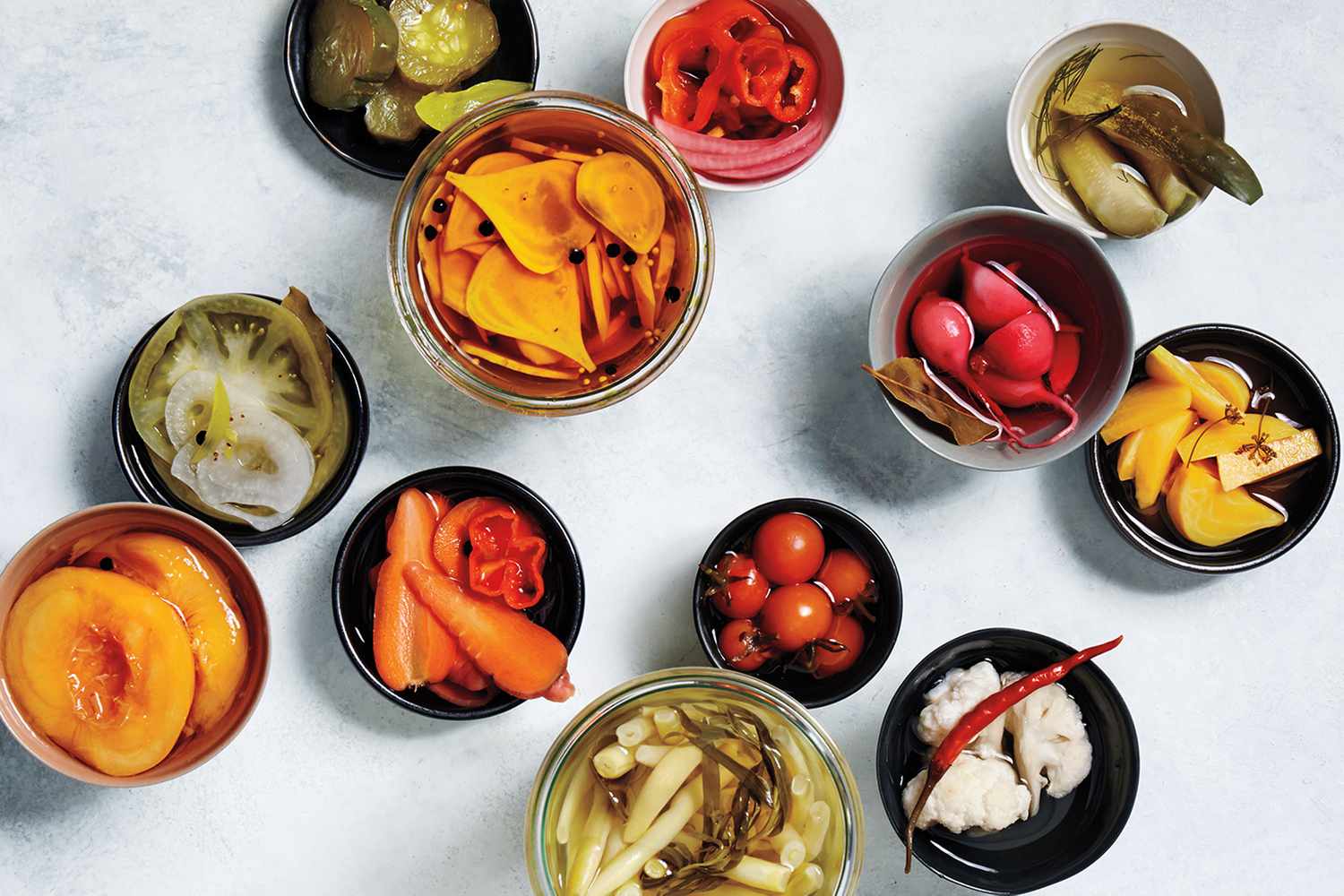 Bowls of various pickled vegetables
