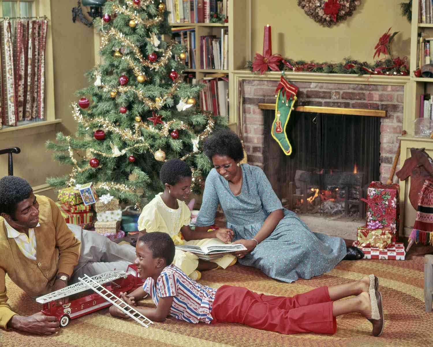 family enjoying Christmas in the living room