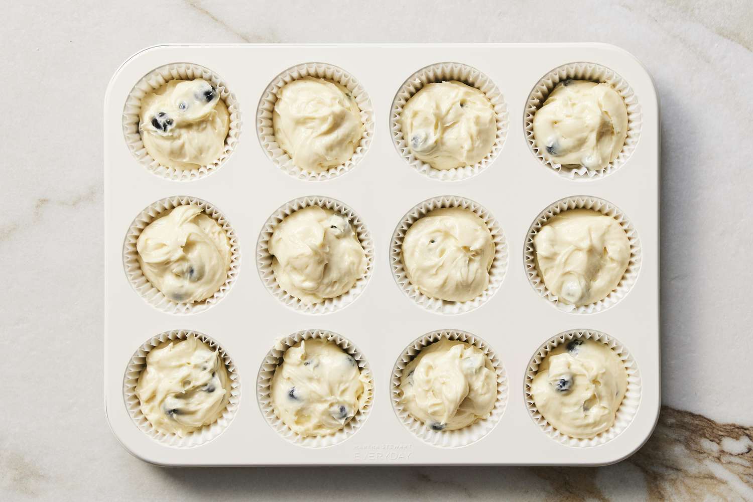 Cupcake batter in pan