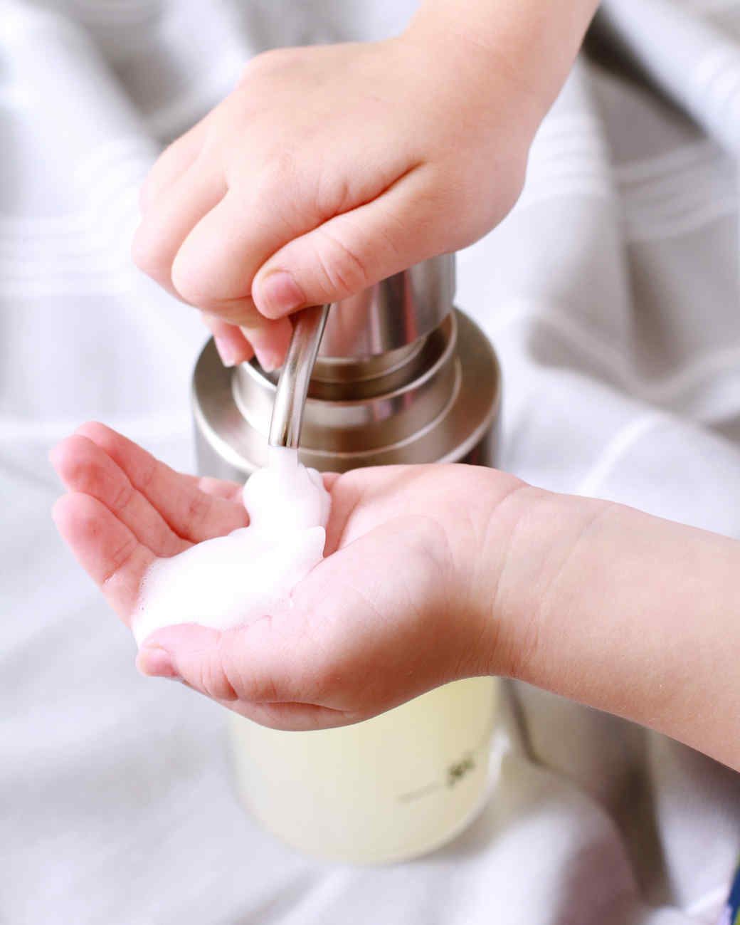 squirting foaming soap into hands