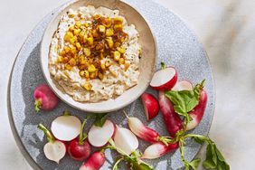 creamy corn-and-onion dip served with radishes