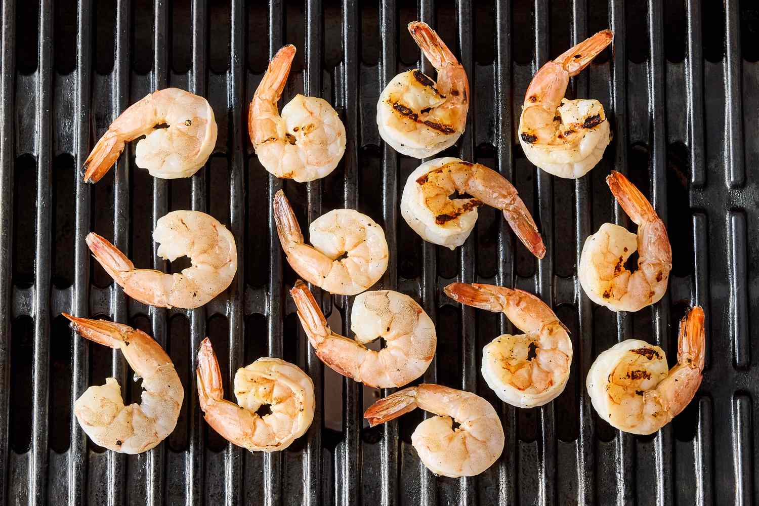 Grilled shrimp on a grill surface