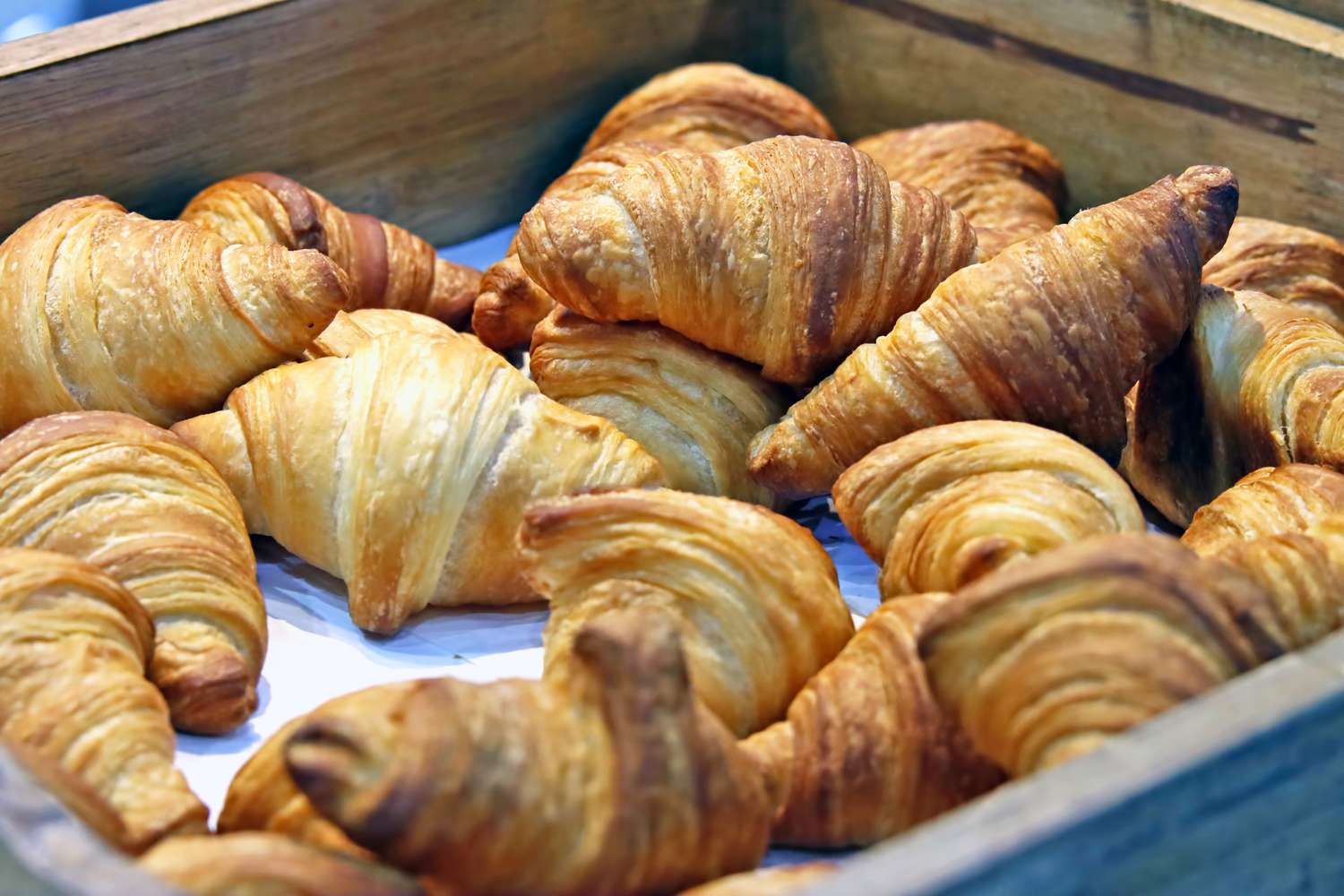 A tray of croissants arranged together